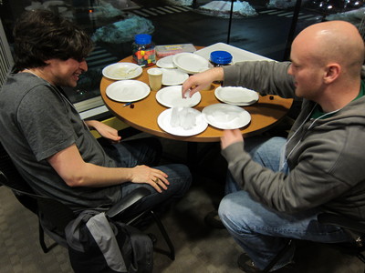 Not all non-digital board games use a board! Some use a napkin. And plates. And ice.