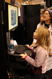 Little girl plays Symon at PAX